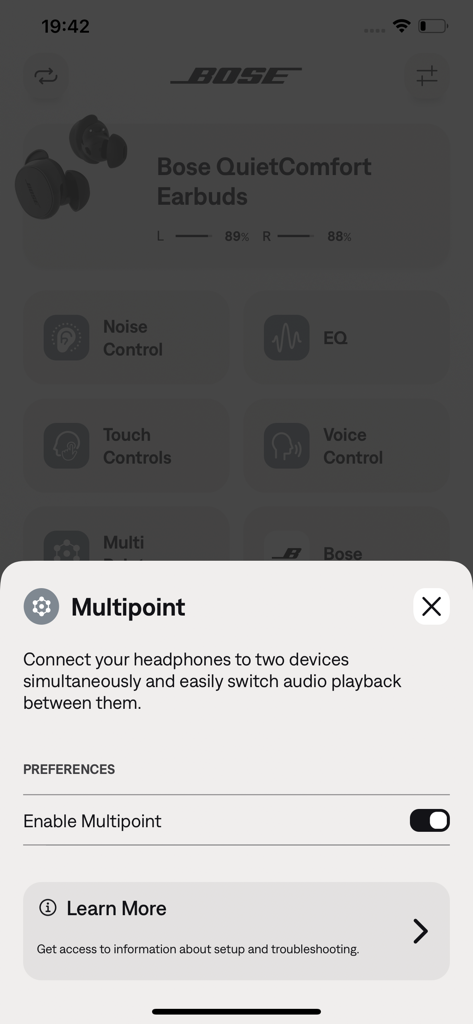 The Bose QC Earbuds app displaying the Multipoint connection setup screen for managing multiple device connections.