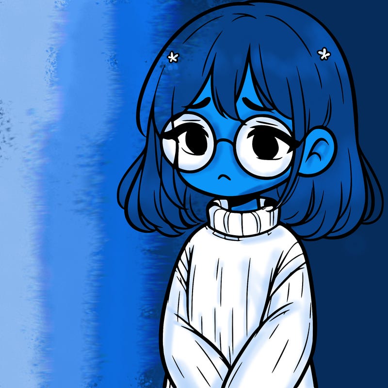sad girl with glasses in a sweater