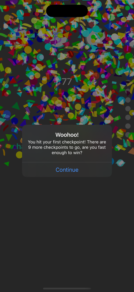 A celebratory popup in the Hacker Keyboard game showing the first checkpoint reached with colorful confetti in the background