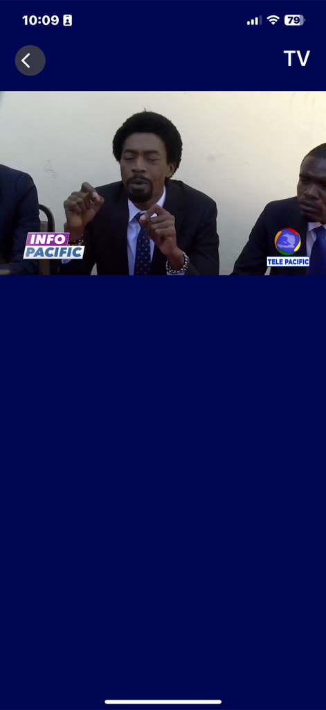 A live TV broadcast stream from Tele Pacific within the mobile app interface showing a news presenter