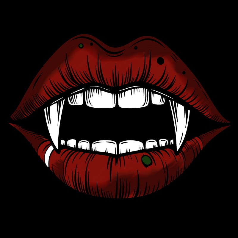 lips with vampire teeth