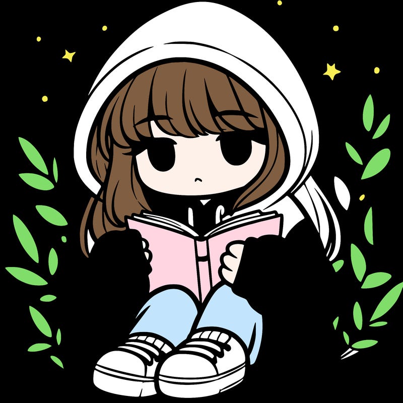 girl in oversized hoodie reading a book