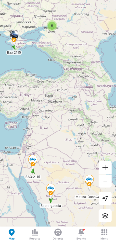 PILOT GPS - Map interface of the PILOT GPS app showing multiple tracked vehicle locations across a regional map