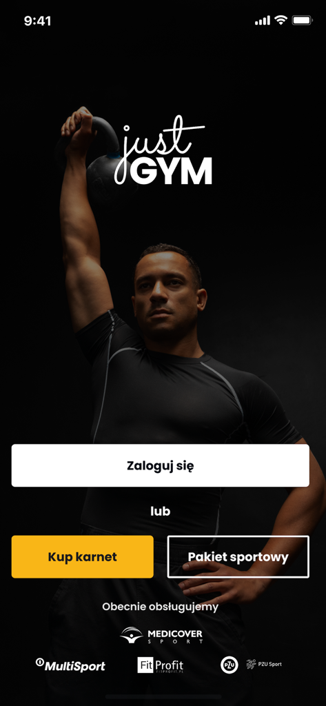 Pantalla de bienvenida de la app Just GYM con botones de inicio de sesión y compra de membresía, mostrando a un hombre levantando una pesa rusa