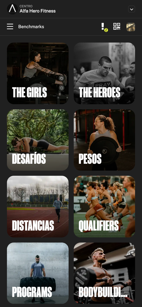Alfa Hero - Alfa Hero app screen showing fitness benchmark categories like The Girls, The Heroes, and Challenges.