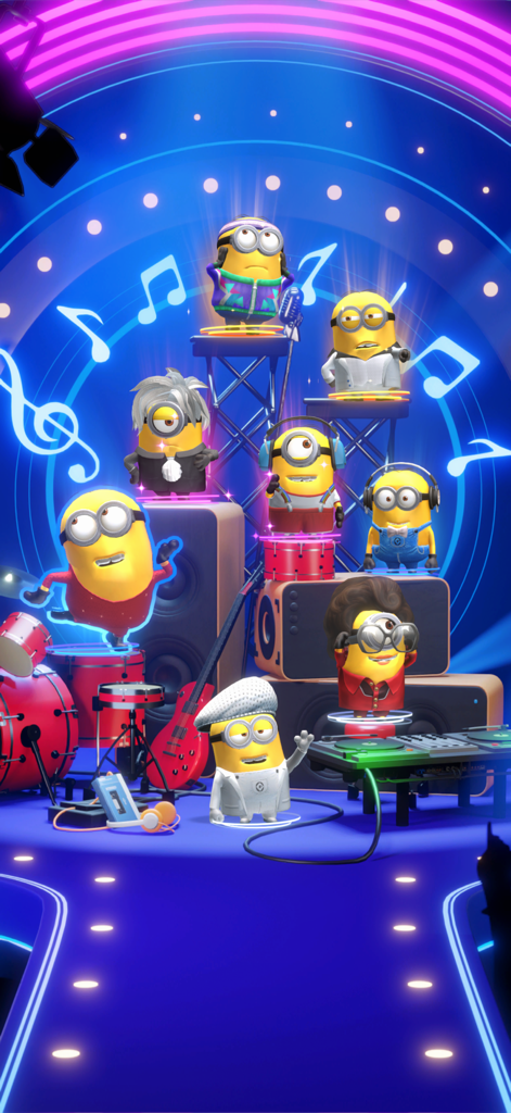 Varios Minions con disfraces temáticos en un escenario musical con luces de neón.