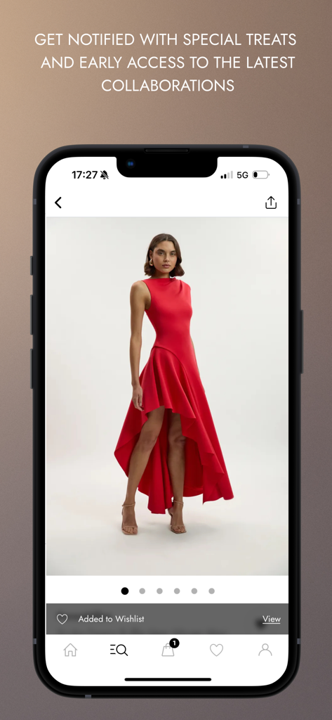 Karen Millen -Women’s Clothing - A model wearing a sophisticated red high-low dress on the Karen Millen mobile shopping app with a wishlist notification.