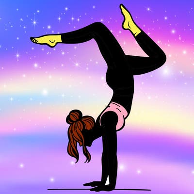 a woman doing a handstand