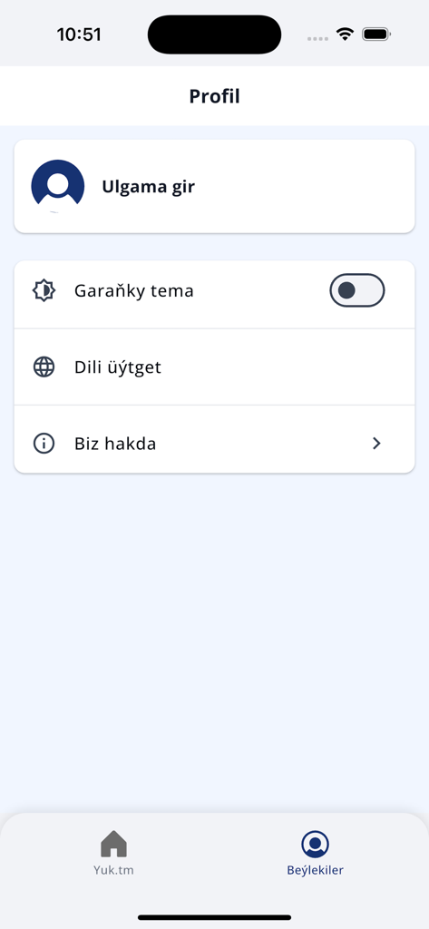 User profile screen of the YUK.TM logistics app featuring settings for login dark mode and language options