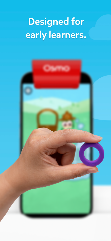 Osmo Counting Town - A hand holding a purple silicone ring in front of a smartphone running the Osmo Counting Town app