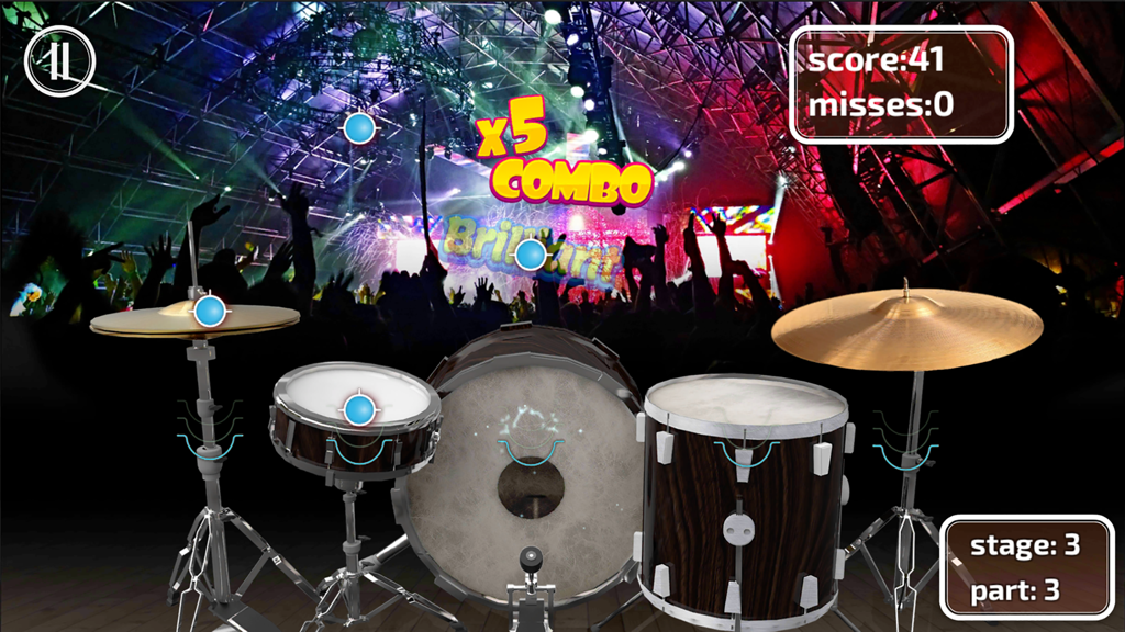 Real Drums Game - Gameplay of Real Drums Game showing a virtual drum kit with score and combo multipliers over a concert background