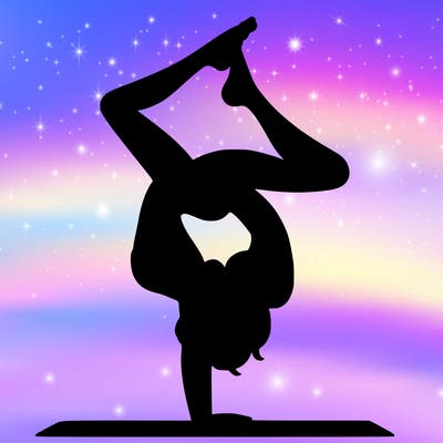 a woman doing a handstand