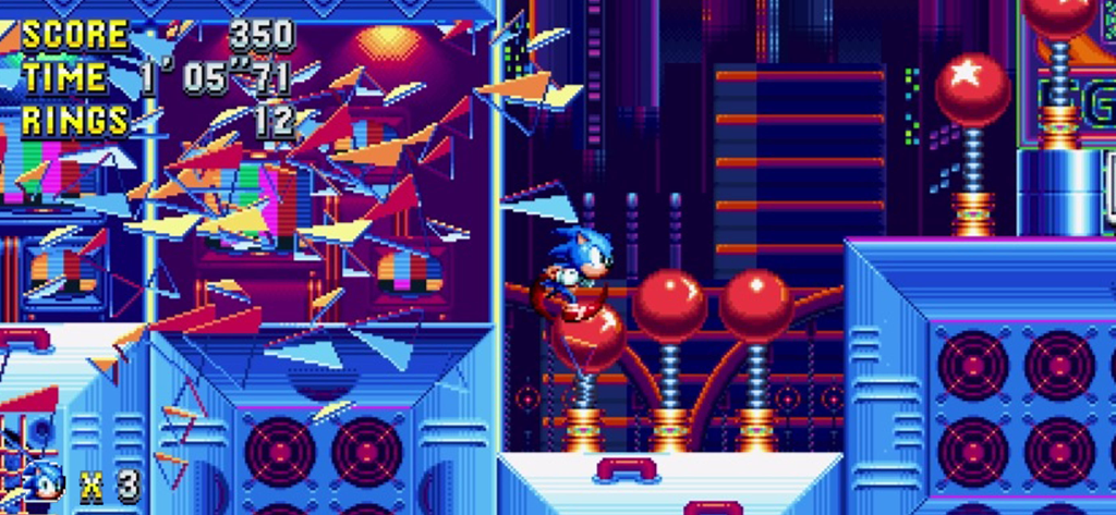 Sonic Mania Plus - NETFLIX - Sonic the Hedgehog salta attraverso un livello retrò pixel art dai colori al neon