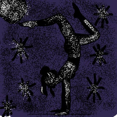 a woman doing a handstand