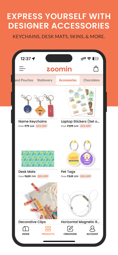 Zoomin: Shop Photobook & Gifts - Mobile interface of Zoomin app showing personalized accessories like keychains and pet tags