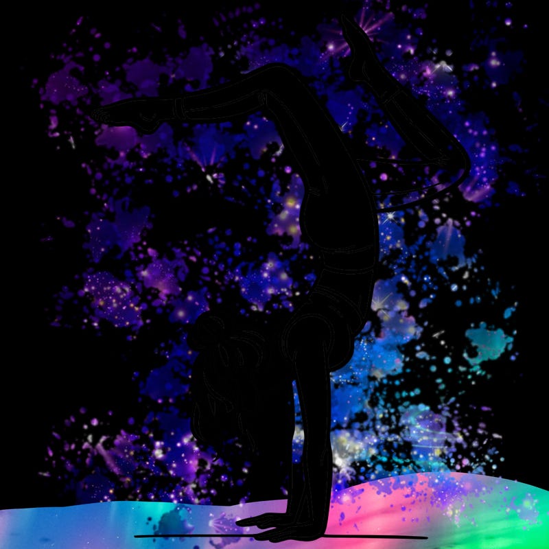 a woman doing a handstand