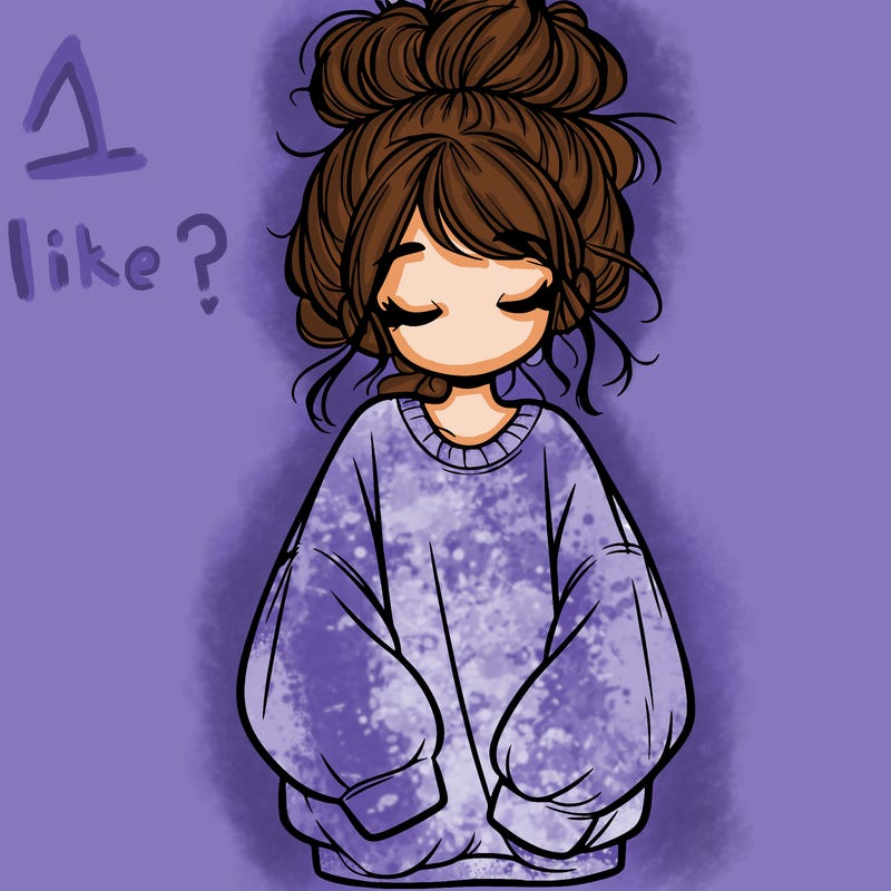 girl with baggy sweatshirt and messy bun