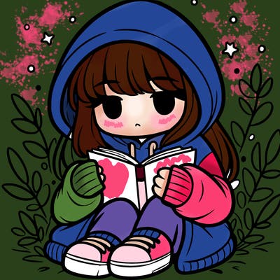girl in oversized hoodie reading a book