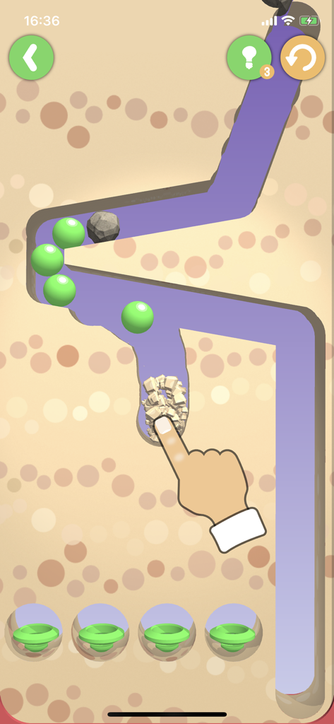 Dig This! - 物理ベースのパズルゲームで、手で砂を掘って緑のボールをカップに導く様子