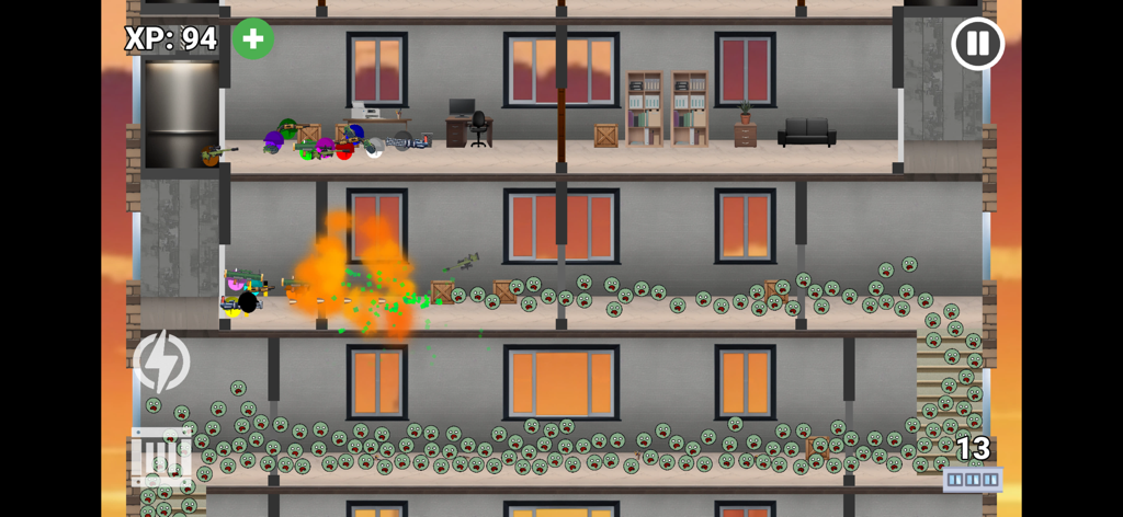 Zombie Tower Escape - Colored marbles fighting a horde of green zombie marbles inside a multi-story building.