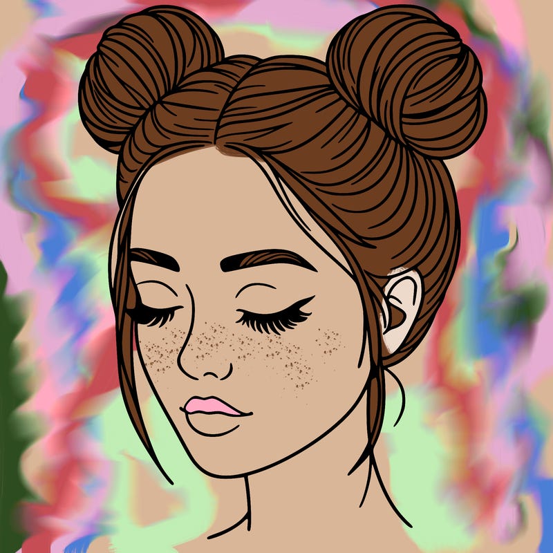woman with hair buns