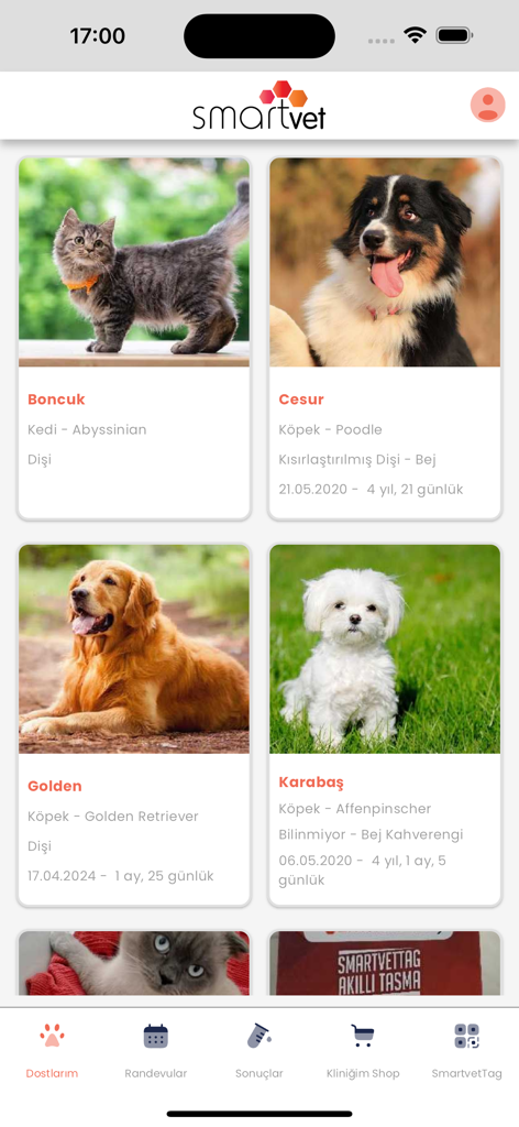 Interface of the SmartVET app showing a dashboard with multiple pet profiles including photos and names