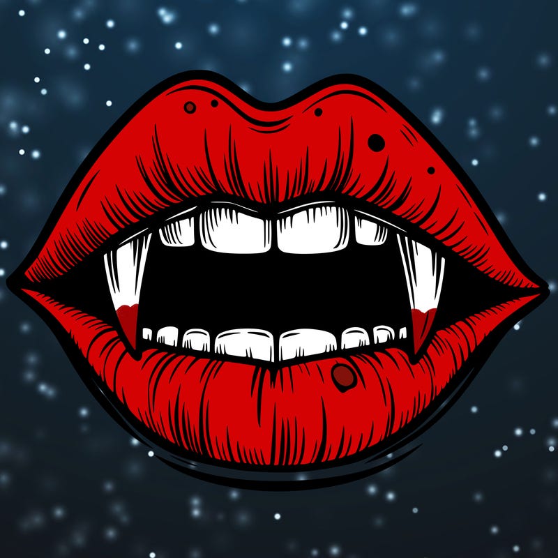 lips with vampire teeth