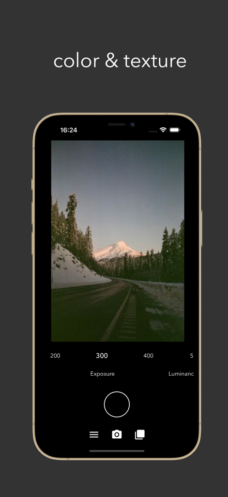Analog Cam app interface displaying a vintage mountain photo with film grain and exposure settings