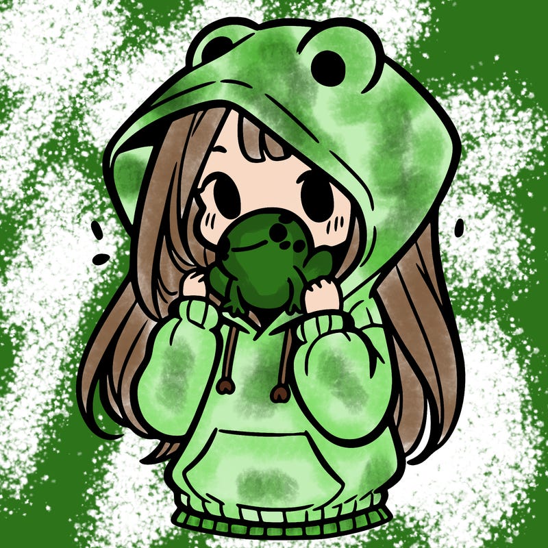 a girl holding a froggy hoodie