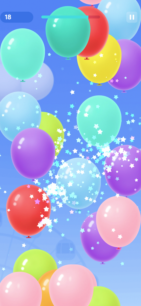 Balloon Pop Game - For Family - Pantalla de juego del Juego de Reventar Globos con globos coloridos y efectos de partículas en forma de estrella.