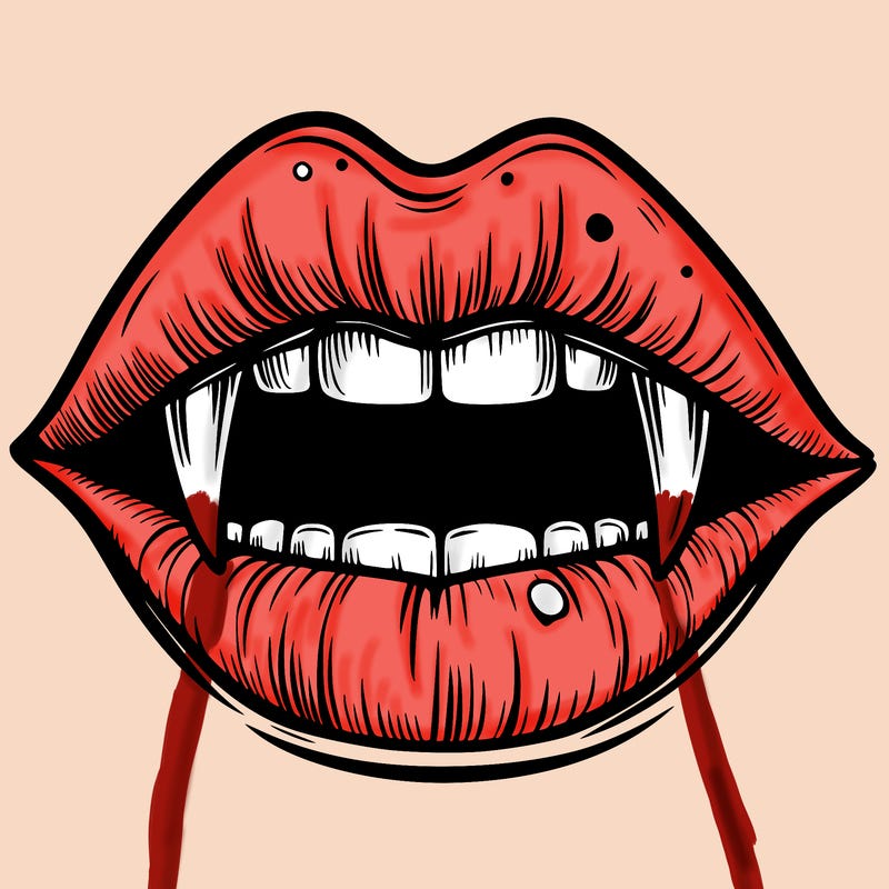 lips with vampire teeth