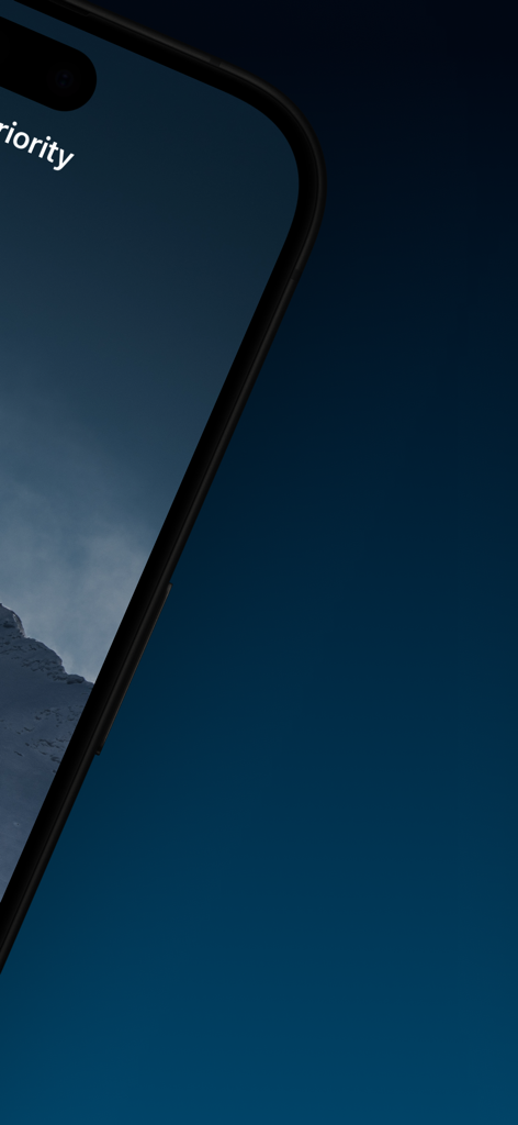 Application Light Meter Ultra sur iPhone affichant les paramètres d'exposition pour un paysage de montagne.