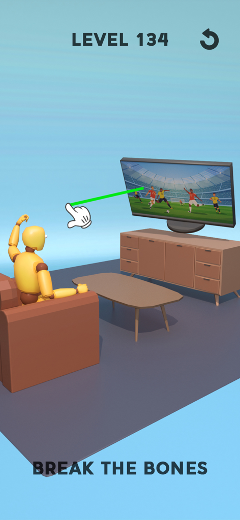 Ragdoll jaune assis dans un salon face à une télévision dans un jeu de soulagement du stress basé sur la physique