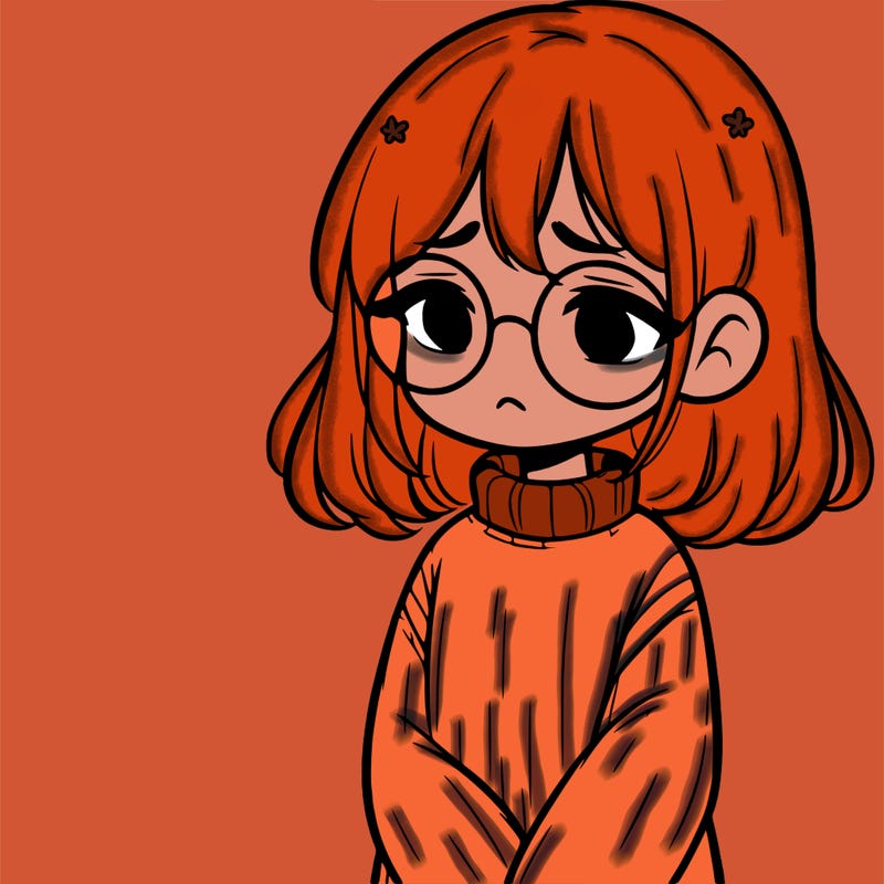 sad girl with glasses in a sweater