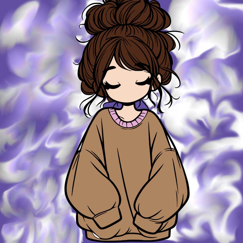 girl with baggy sweatshirt and messy bun