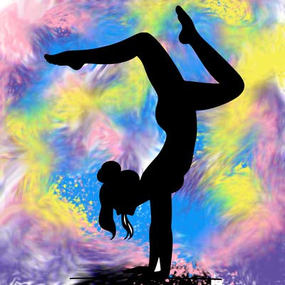 a woman doing a handstand