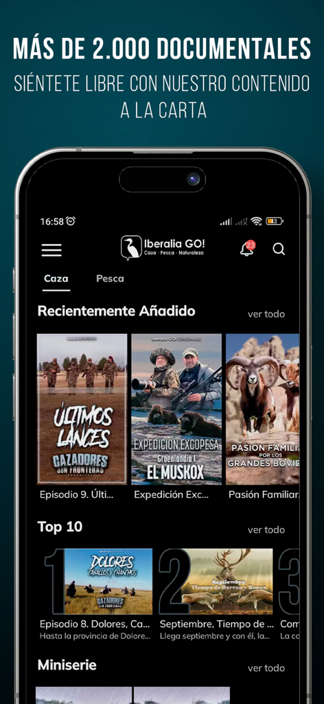 Un smartphone mostrando la interfaz de la app Iberalia GO con una selección de documentales de caza y pesca.