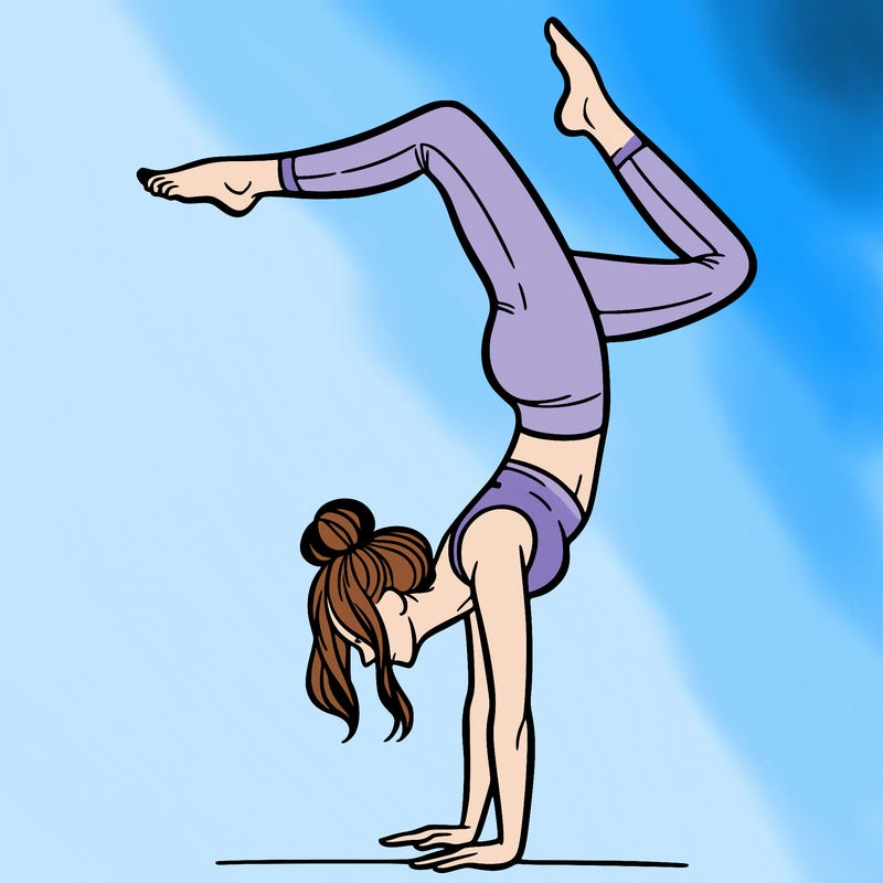 a woman doing a handstand