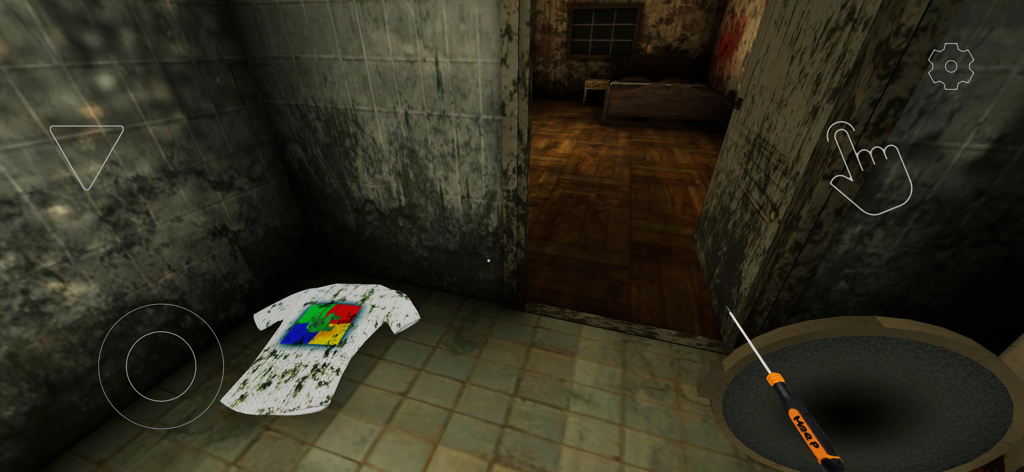 First person view of a grimy room in the Evil Doll horror game with a puzzle t shirt on the floor