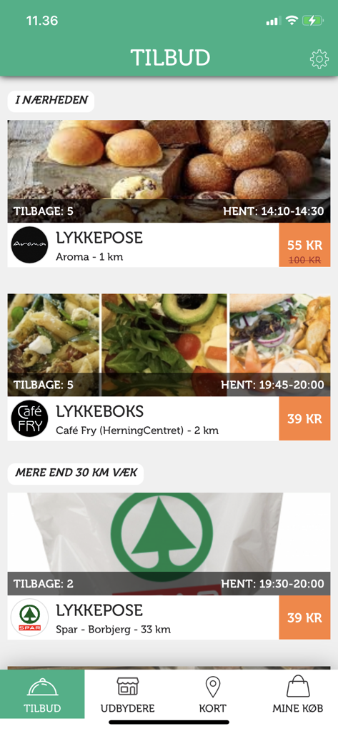 Uma lista de sacolas e caixas de alimentos com desconto disponíveis para retirada no aplicativo RedMaden.