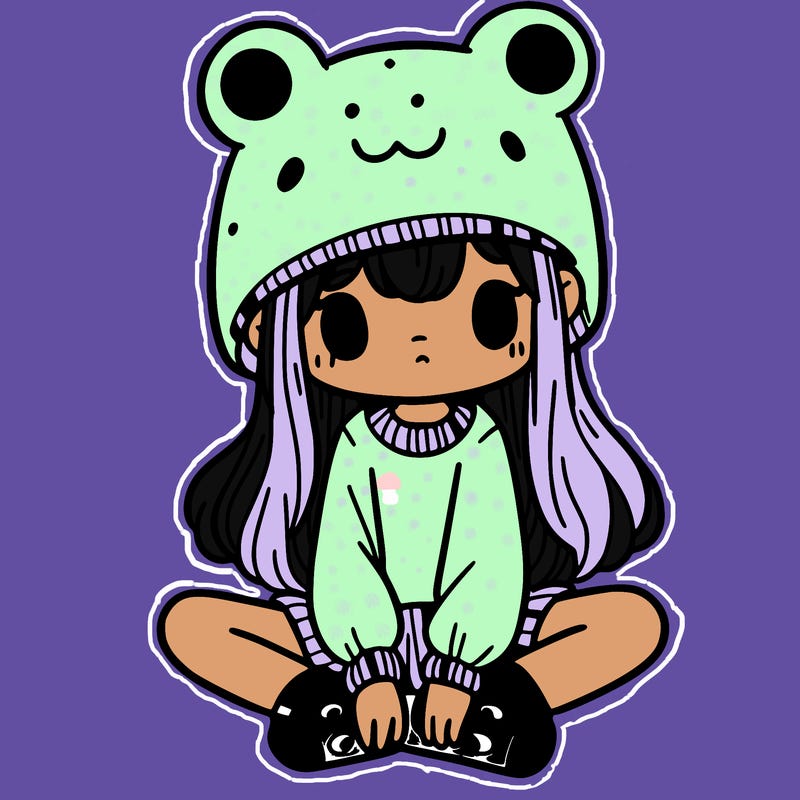 a girl wearing a frog hat and some frog socks