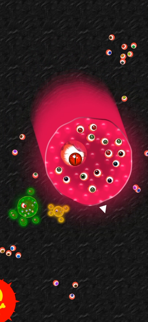 Alien Blob io - A large pink alien blob with multiple eyes in a competitive multiplayer arena battle