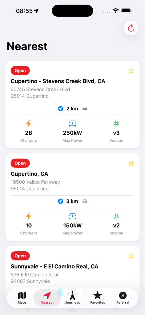Supercharger for Tesla Station - A list of nearby Tesla Supercharger stations in the app showing address distance and charging power.