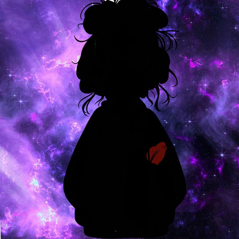 girl with baggy sweatshirt and messy bun