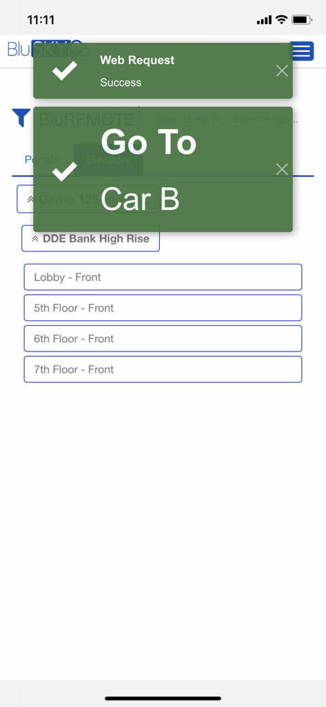 Interface de l'application BluSKY montrant une notification de succès de demande d'ascenseur à distance.