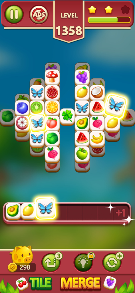 Tile Merge ：Match Puzzle - A triple match puzzle level featuring colorful fruit and butterfly tiles.