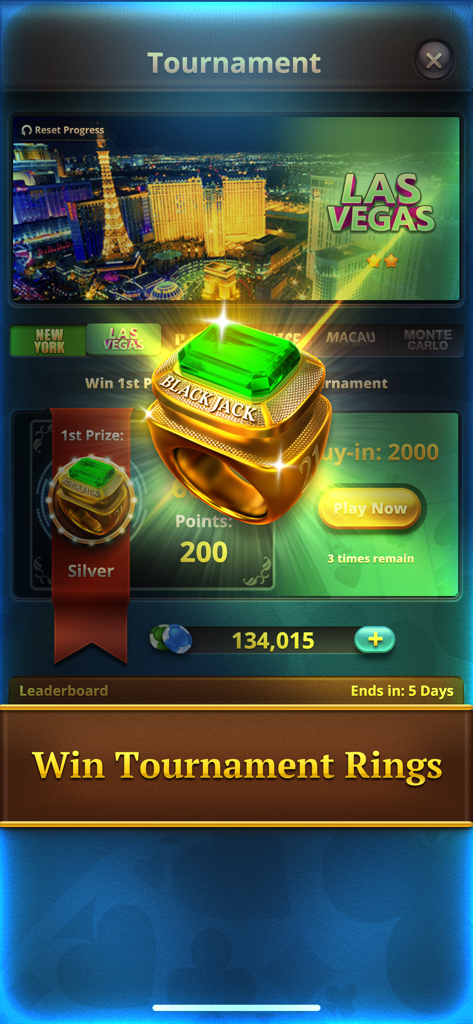 Blackjack tournament interface showing a golden winner ring with a green gemstone and a Las Vegas skyline background.