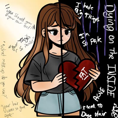 a girl holding a broken heart