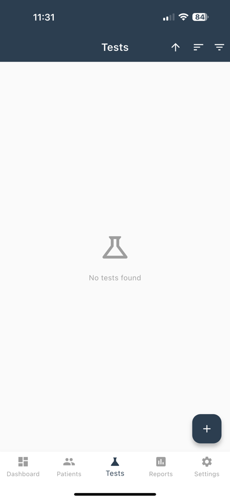 Interface de l'application Gestion de Laboratoire montrant la section des tests vide avec une icône de bécher et une barre de navigation inférieure