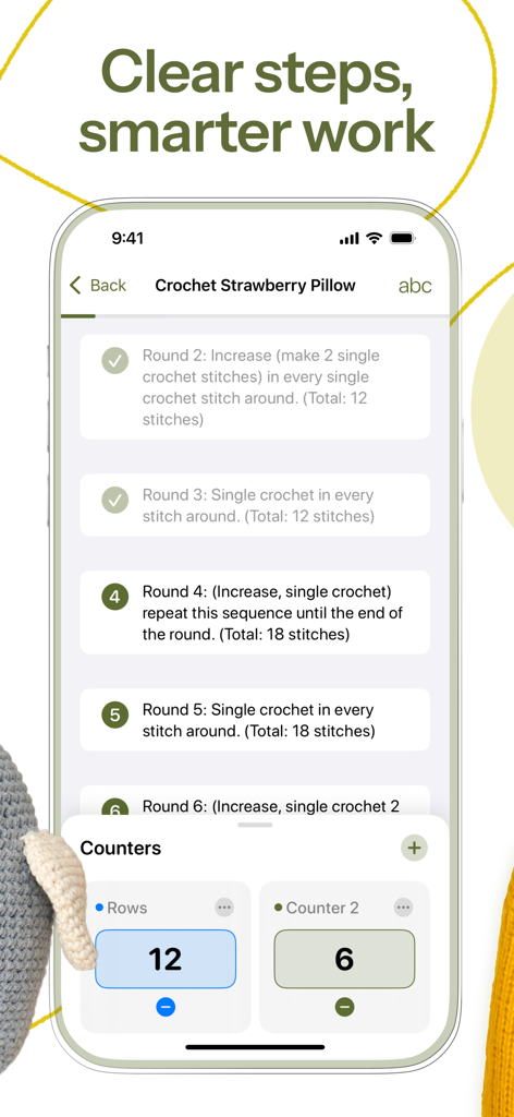 Loopsy - Crochet & Knitting - Loopsy App-Oberfläche, die interaktive Häkelmuster-Schritte für ein Erdbeerkissen mit integrierten Reihen- und Stichzählern zeigt.